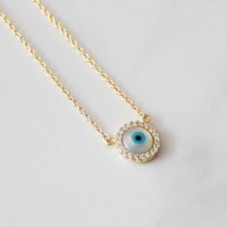 COLLAR DE PLATA OJO EN CONCHA Y PERLA CON BORDE DE CIRCONES