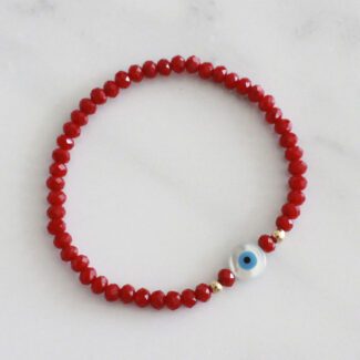 PULSERA CRISTALES ROJOS CON OJITO EN CONCHA Y PERLA