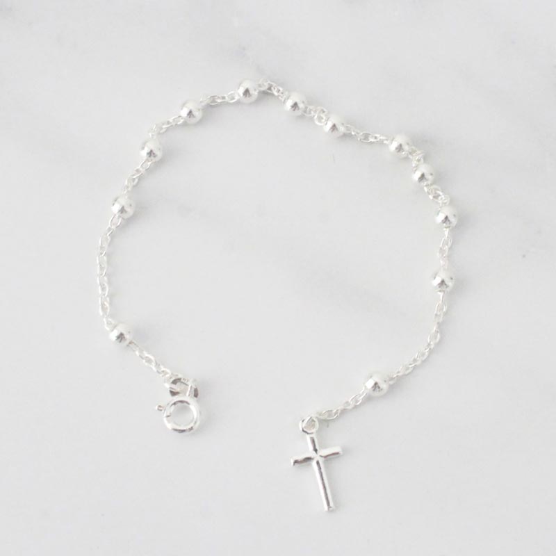 PULSERA DENARIO Y CRUZ